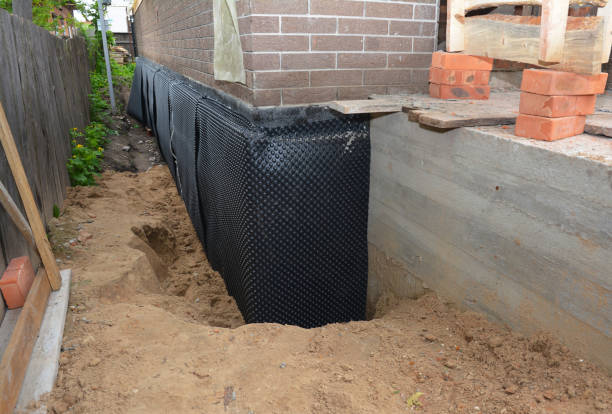 Happy homeowners after waterproofing job in Kellyton